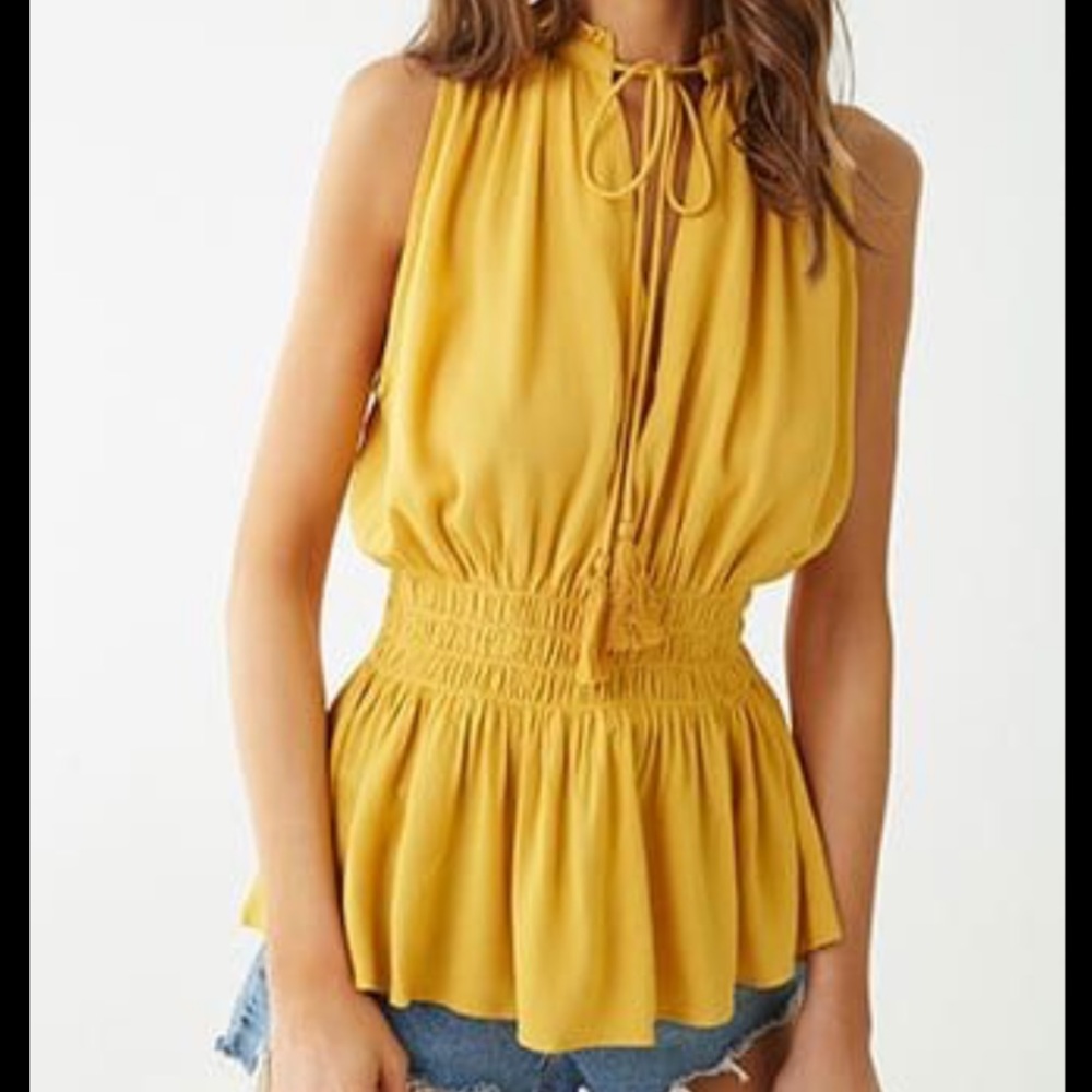 Sleeveless tassle v-neck tunic